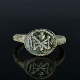 Byzantine bronze ring with monogram and cross