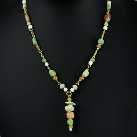 Necklace with Roman green, white and amber glass beads