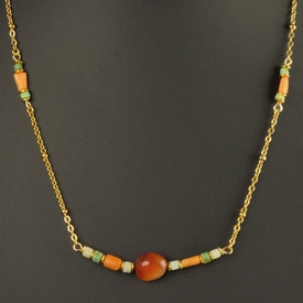 Necklace with Egyptian faience, carnelian and coral beads