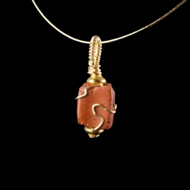 Pendant with a wire-wrapped Roman red glass bead