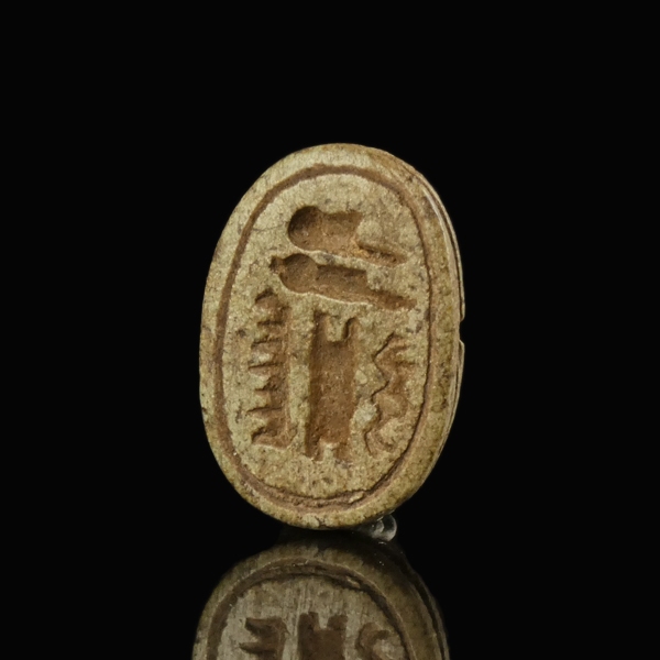 Ancient Egypt, steatite scarab with hieroglyphs IMEN-MERY