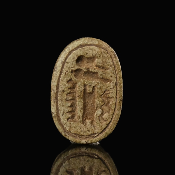 Ancient Egypt, steatite scarab with hieroglyphs IMEN-MERY