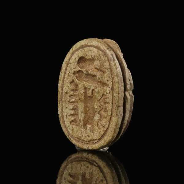 Ancient Egypt, steatite scarab with hieroglyphs IMEN-MERY