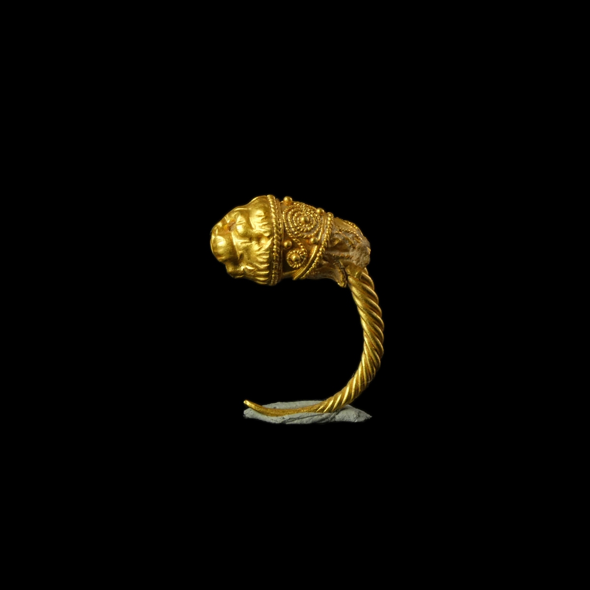 Ancient Greek Hellenistic gold lion's head earring