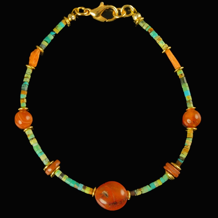 Bracelet with Egyptian faience, carnelian and coral beads