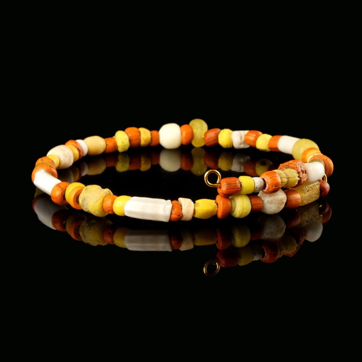 Bracelet with Roman orange, yellow glass and shell beads