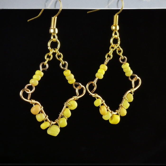 Earrings with Roman wire-wrapped yellow glass beads