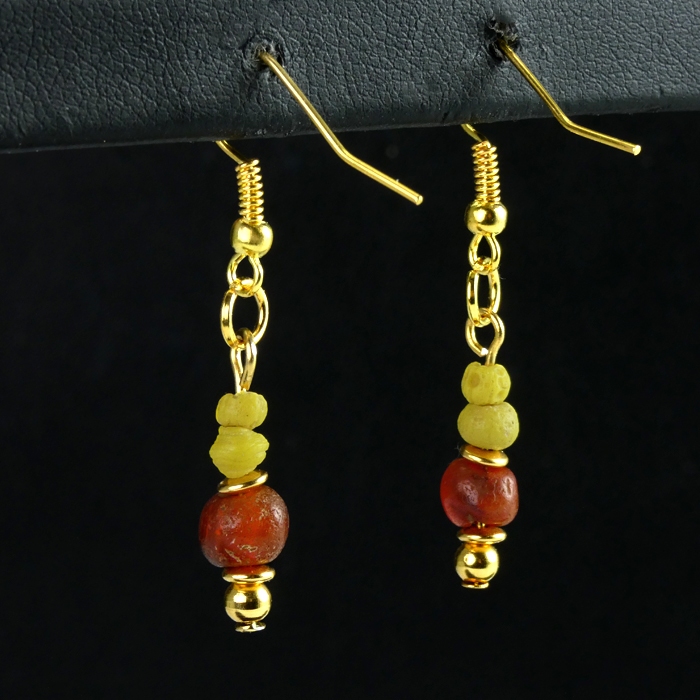 Earrings with yellow Roman glass and carnelian beads