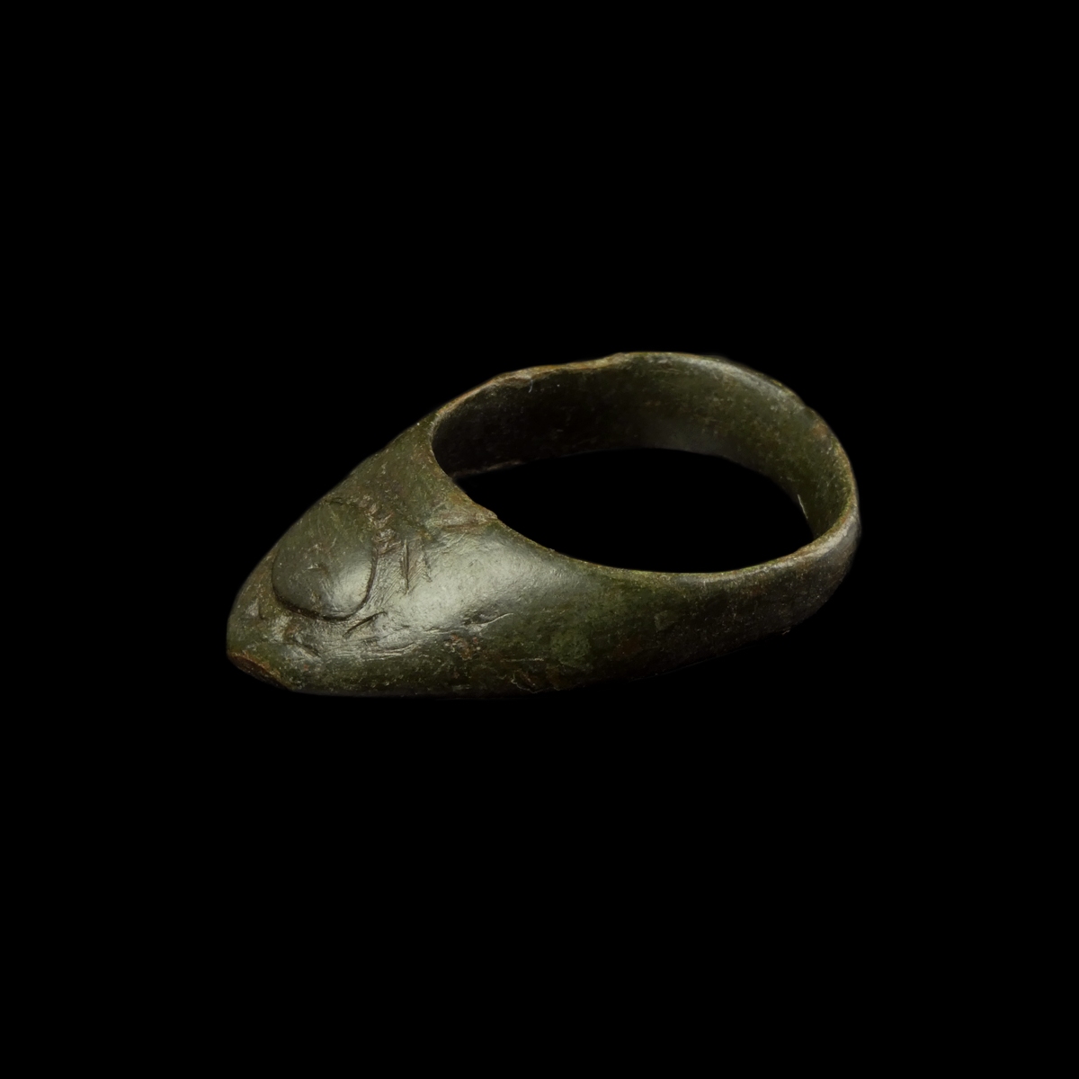 Medieval bronze Archer thumb ring with 'Evil Eye'