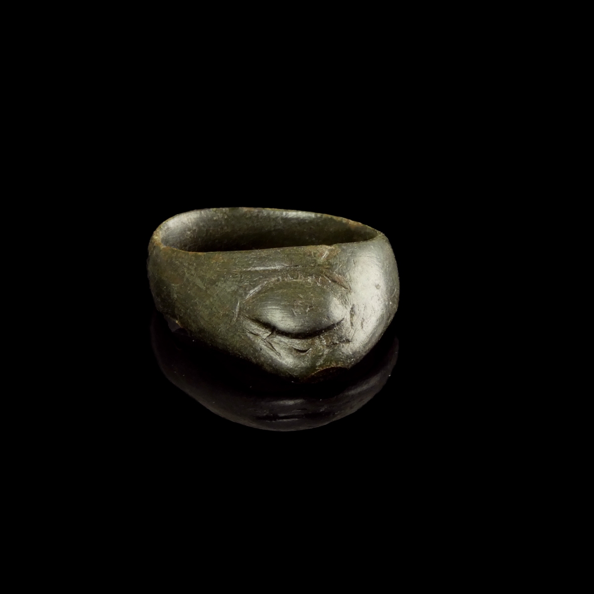 Medieval bronze Archer thumb ring with 'Evil Eye'