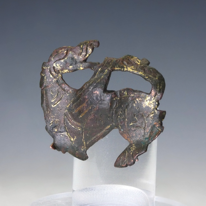 Medieval stud or mount with griffin