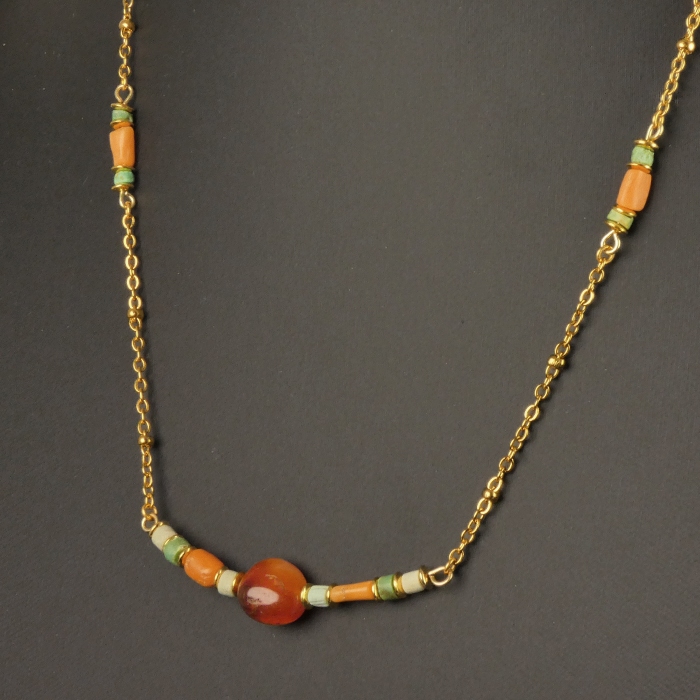 Necklace with Egyptian faience, carnelian and coral beads