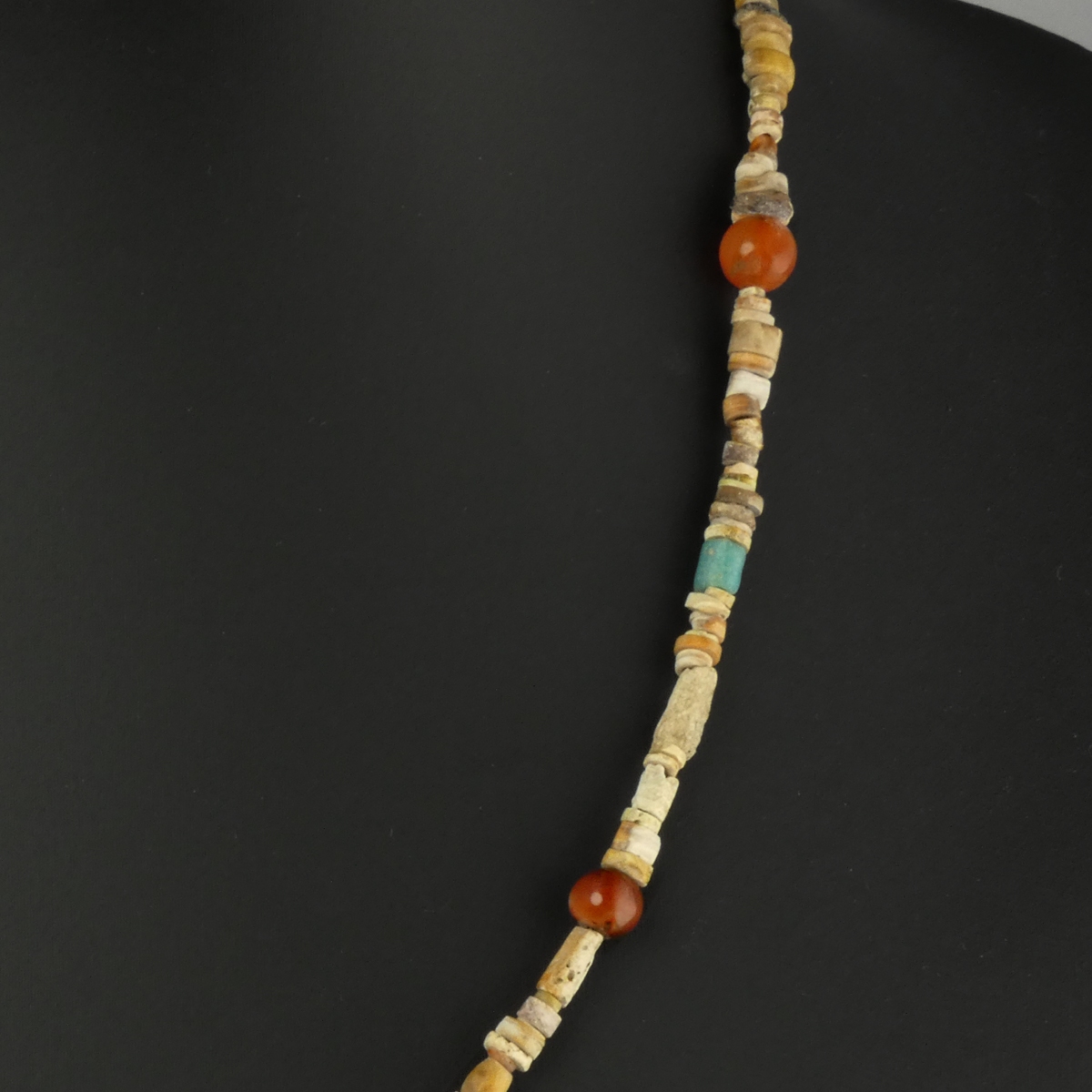 Necklace with Egyptian faience, glass, carnelian beads