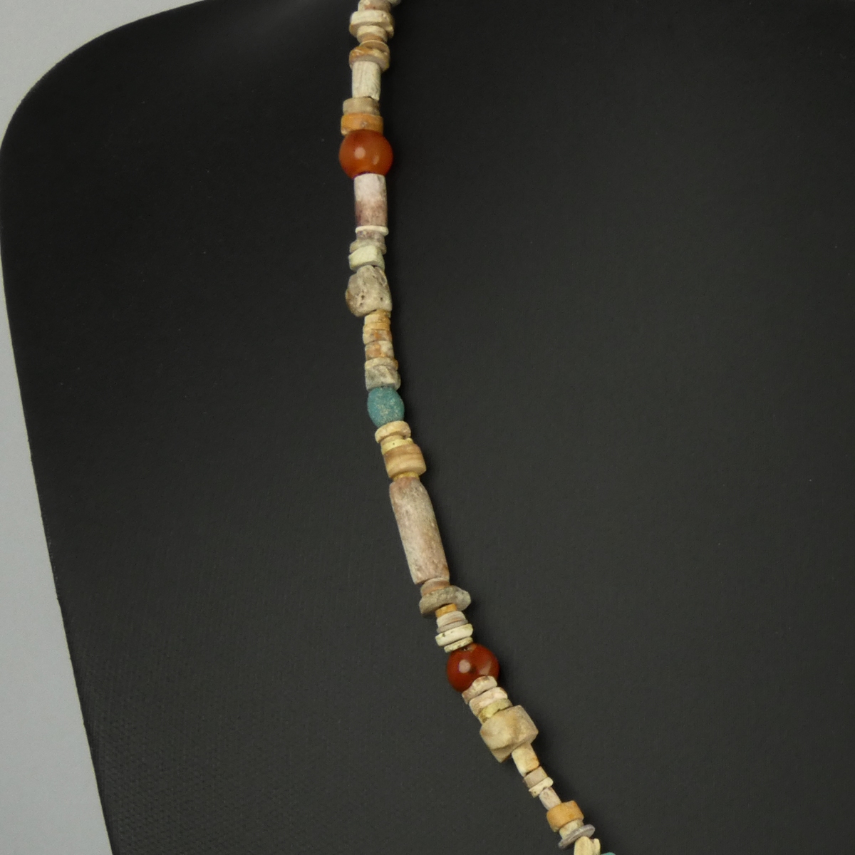 Necklace with Egyptian faience, glass, carnelian beads