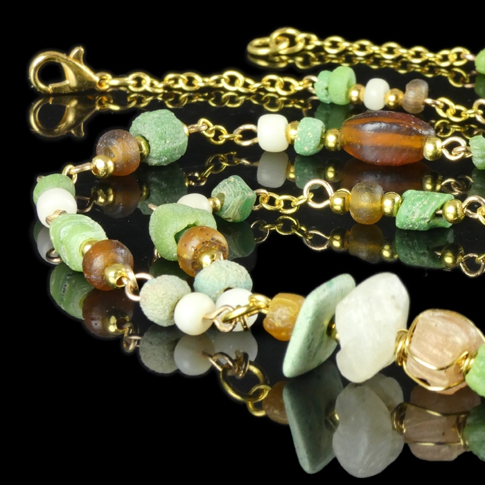 Necklace with Roman green, white and amber glass beads