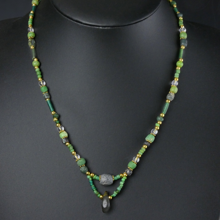 Necklace with Roman green glass and stone beads