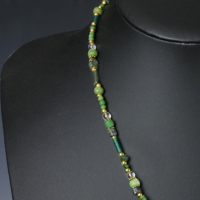 Necklace with Roman green glass and stone beads