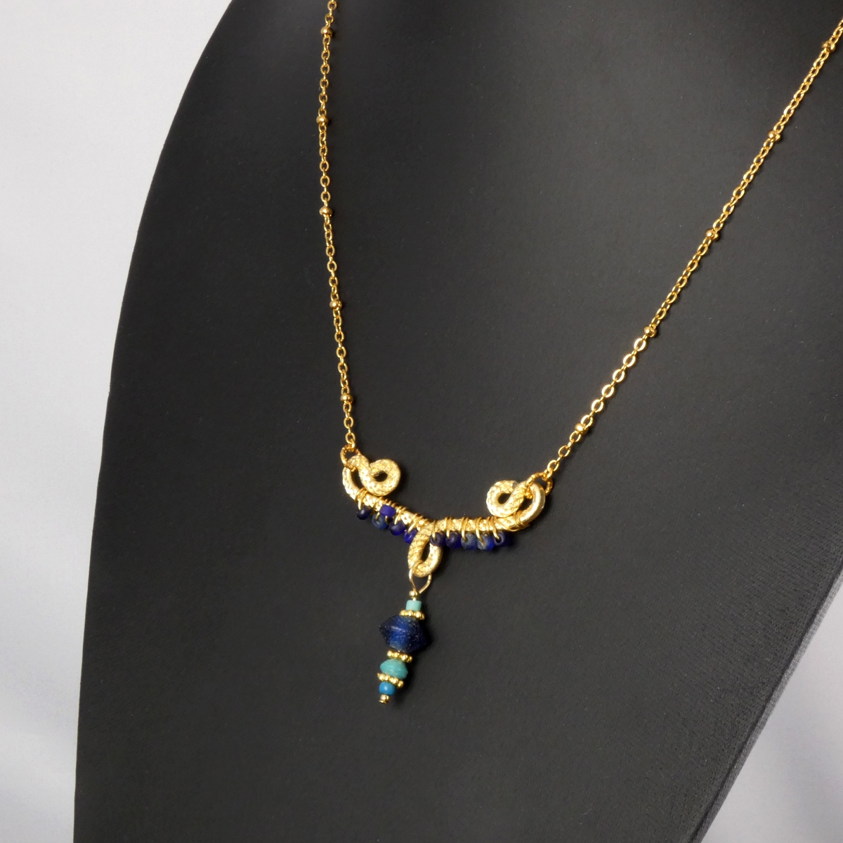 Necklace with wire-wrapped Roman blue and turquoise glass beads