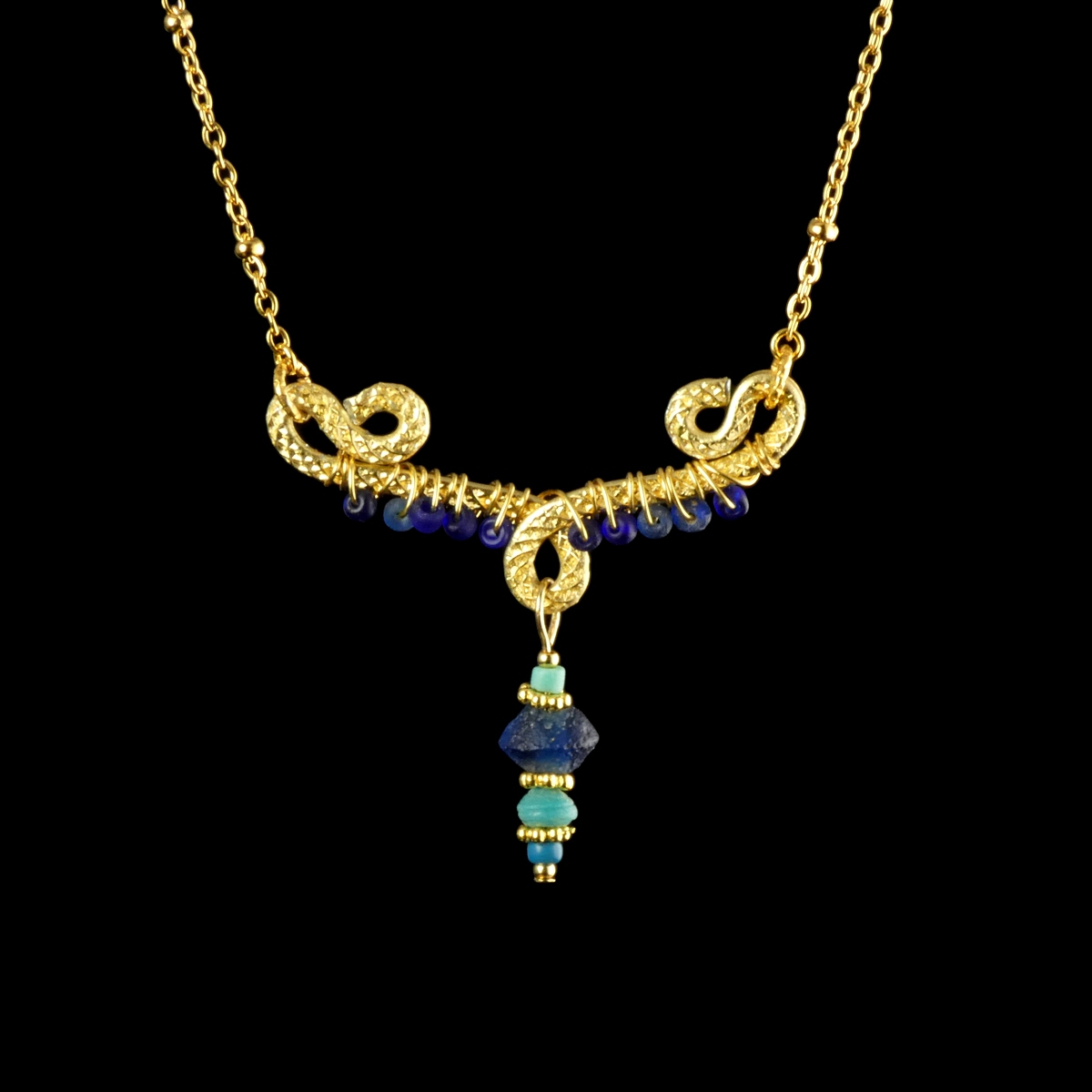 Necklace with wire-wrapped Roman blue and turquoise glass beads