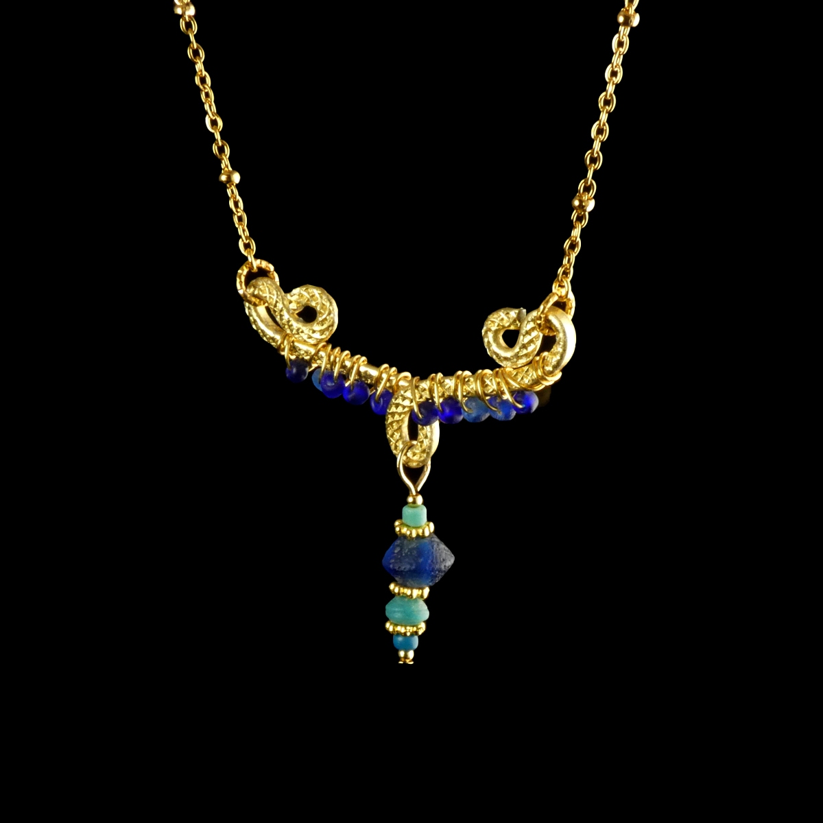 Necklace with wire-wrapped Roman blue and turquoise glass beads