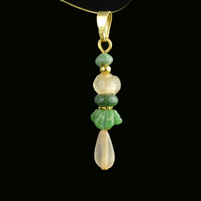 Pendant with Roman green and semi-translucent glass beads