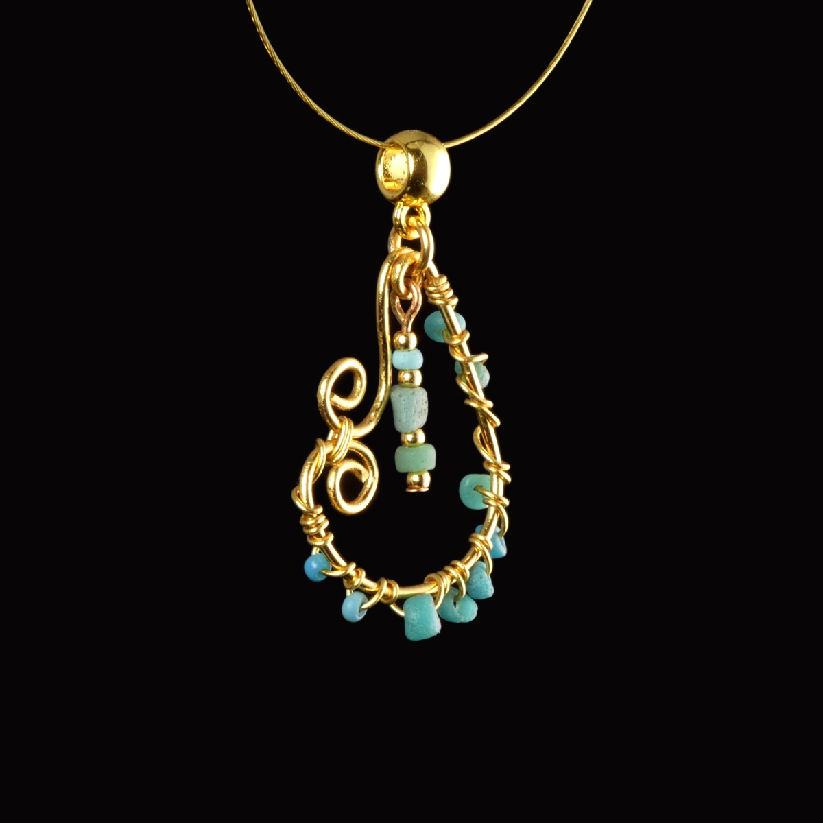 Pendant with Roman wire-wrapped turquoise glass beads