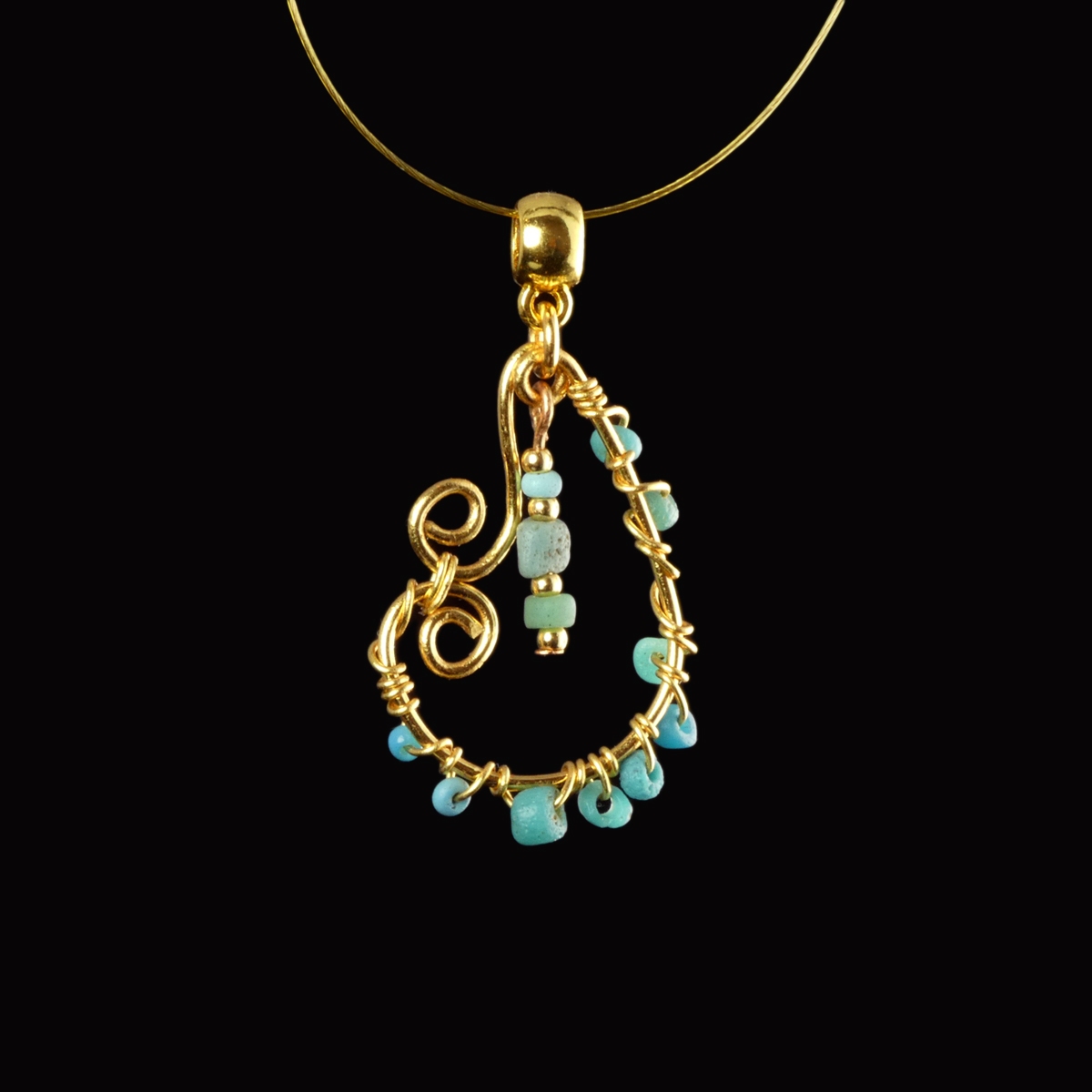 Pendant with Roman wire-wrapped turquoise glass beads