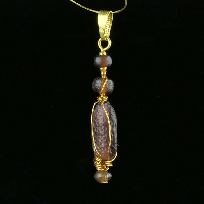 Pendant with wire-wrapped Roman purple glass beads