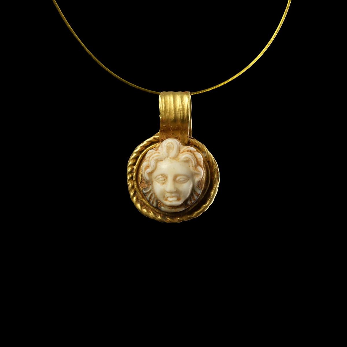 Roman gold pendant with sardonyx Medusa cameo