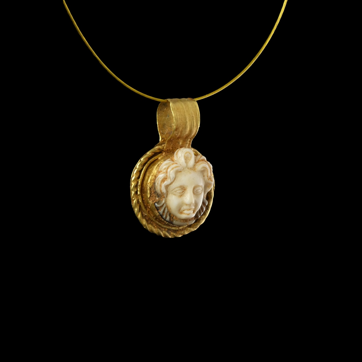 Roman gold pendant with sardonyx Medusa cameo