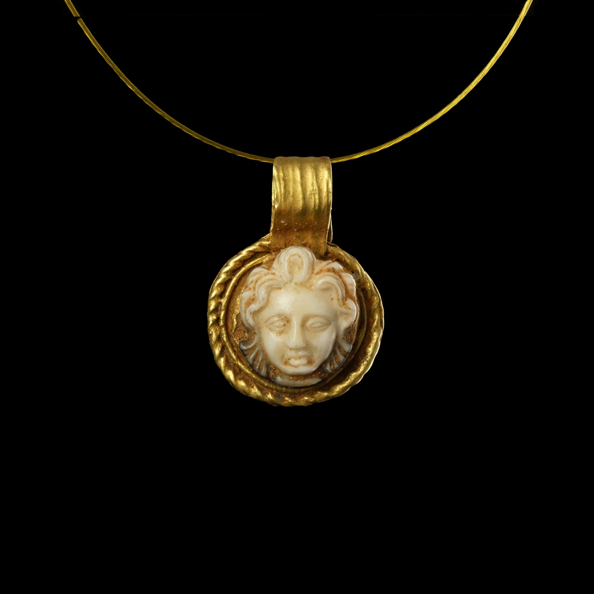 Roman gold pendant with sardonyx Medusa cameo