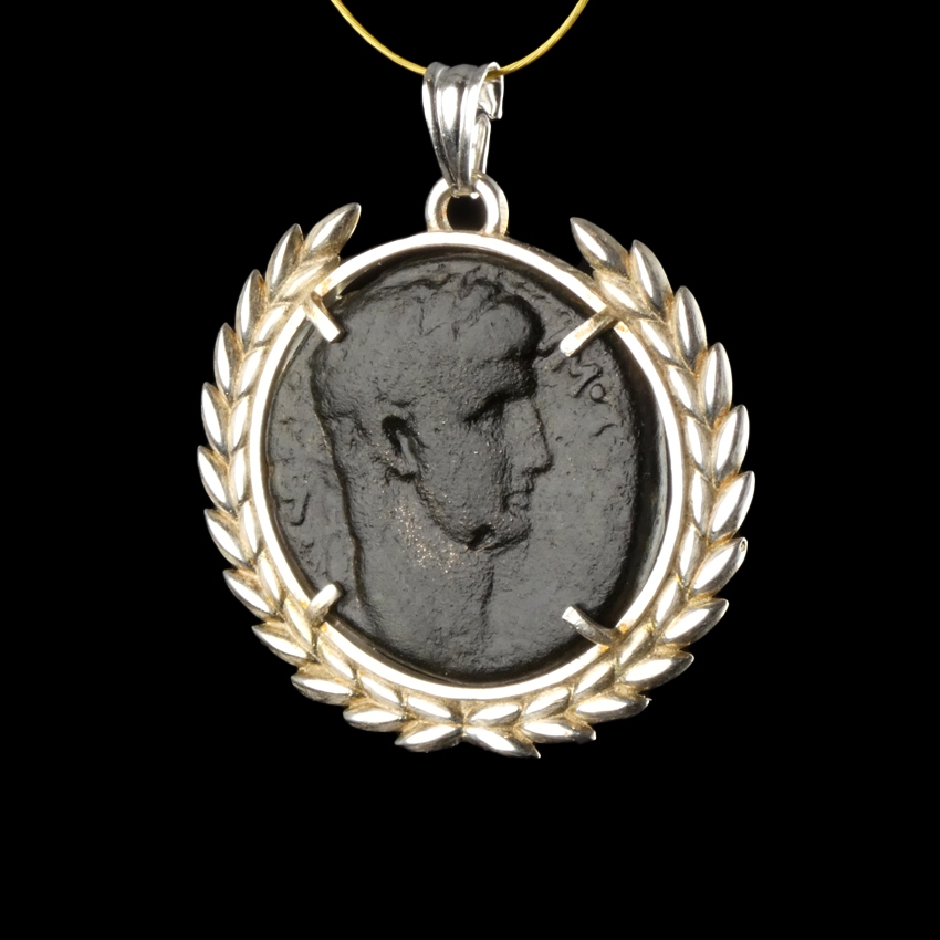 Silver pendant with Roman coin of Claudius