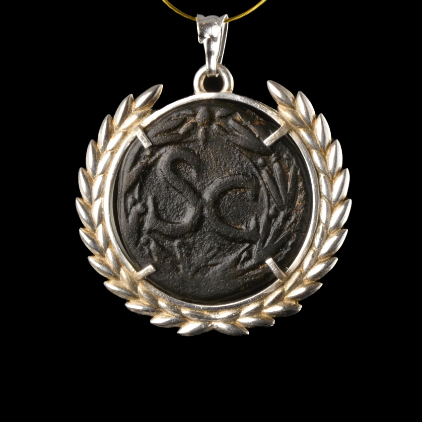 Silver pendant with Roman coin of Claudius