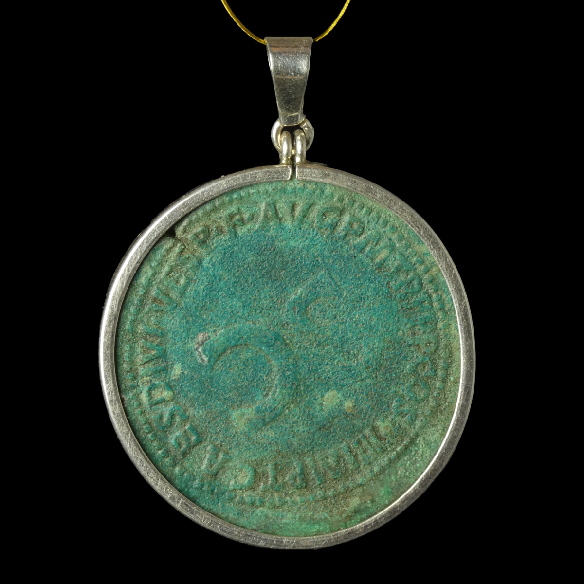 Silver pendant with Roman coin of Vespasian