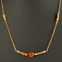 Necklace with Egyptian faience, carnelian and coral beads