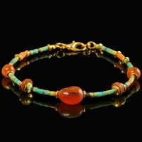 Bracelet with Egyptian faience, carnelian and coral beads