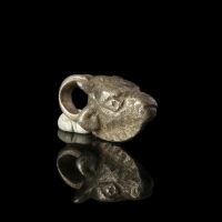 Roman silver Bull's head amulet pendant