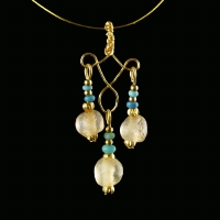 Pendant with Roman turquoise, semi-translucent glass beads