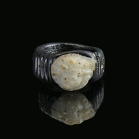 Roman glass ring with glass Medusa cameo